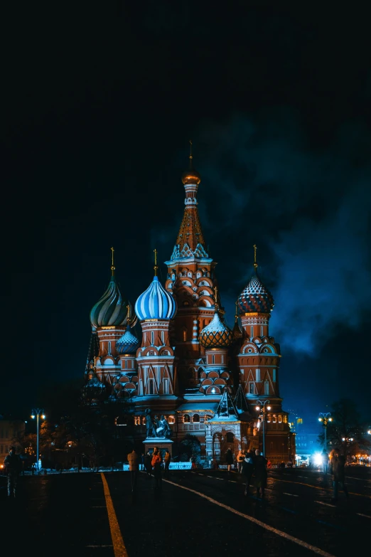 the cathedral of st basil is lit up at night, an album cover, pexels contest winner, baroque, movie photo, plain background, trending on 500px, multiple stories