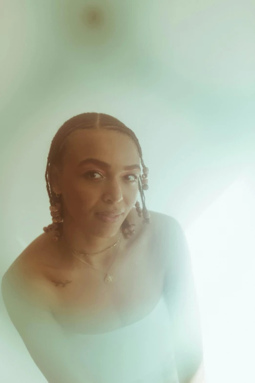 a woman in a white dress holding a tennis racquet, an album cover, inspired by Carrie Mae Weems, unsplash, renaissance, wears a egyptian ankh necklace, discreet lensflare, ((portrait)), doja cat