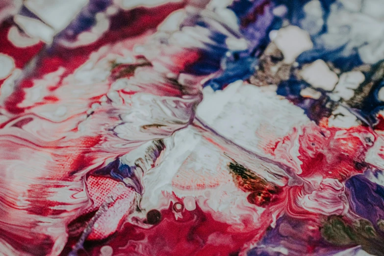 a close up of a painting on a table, a detailed painting, inspired by Shōzō Shimamoto, trending on unsplash, action painting, purple and red, red and white colors, american velvet painting, unsplash transparent fractal