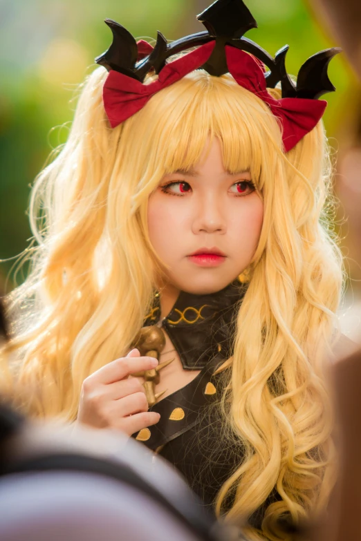 a woman with long blonde hair wearing a red bow, inspired by Yang J, anime convention, twice, ap, mid closeup