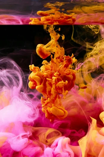a close up of a red and yellow substance, inspired by Kim Keever, pexels contest winner, pink and yellow, made of liquid, liquid smoke, ink blot