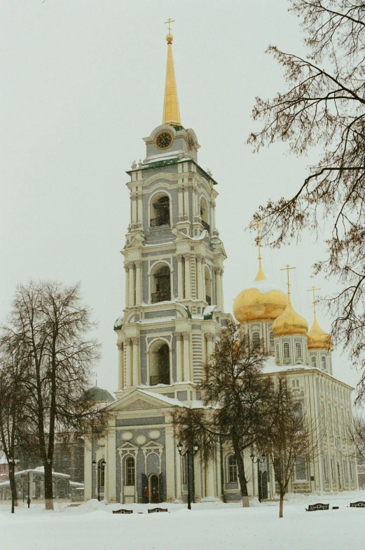 an image of a church in the snow, inspired by Vasily Surikov, unsplash, silver gold red details, square, low quality photo, high towers