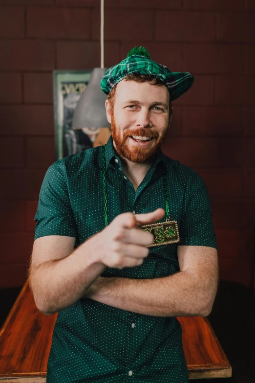 a man sitting at a table with a plate of food, ginger hair with freckles, pots of gold, aussie baristas, wearing an ornate outfit