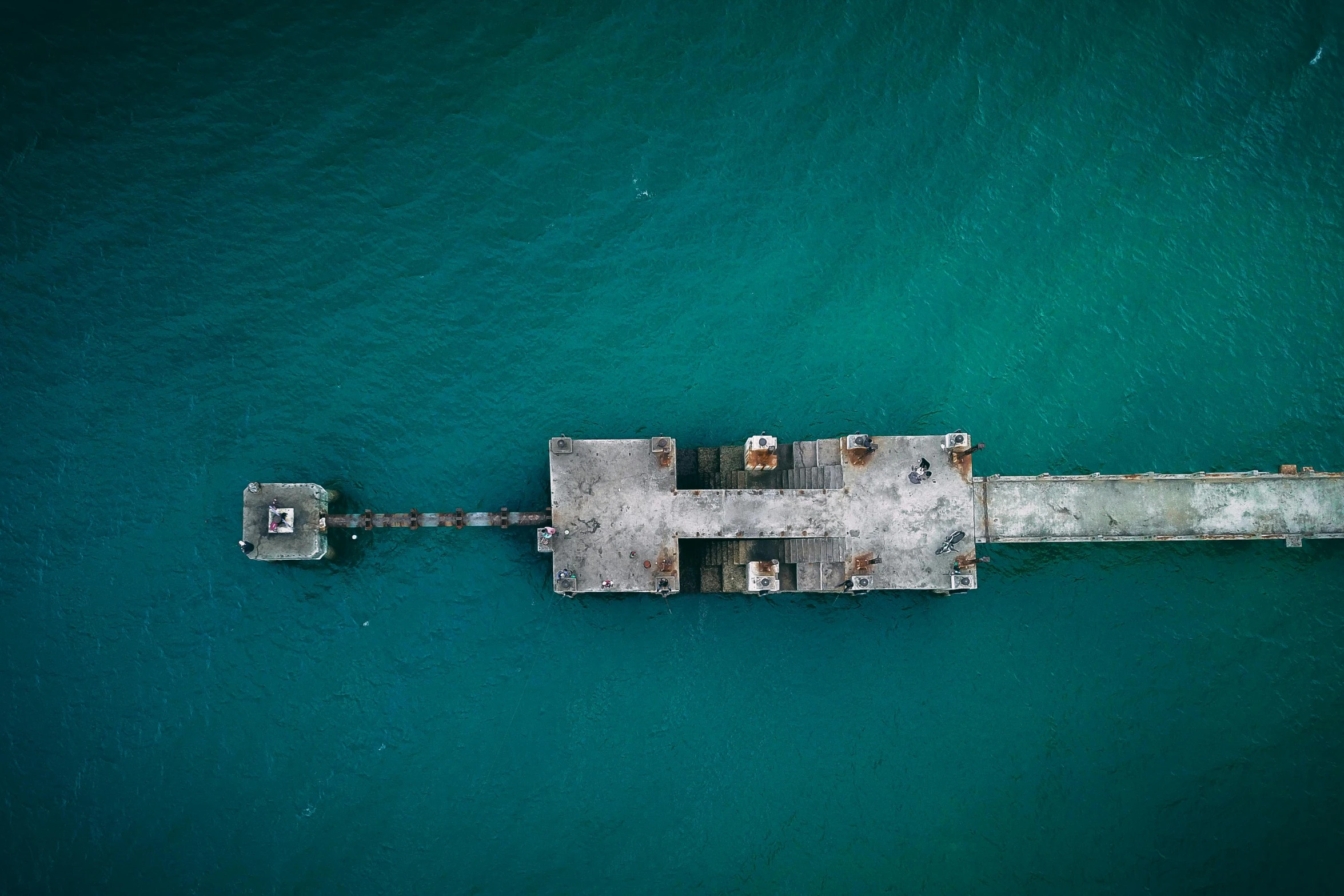 a pier in the middle of a body of water, an album cover, by Adam Marczyński, unsplash contest winner, turquoise rust, aerial, wallpapers