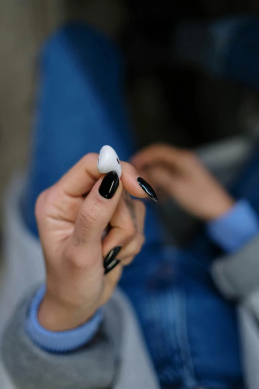 a woman holding a toothbrush in one hand and a toothpaste in the other, by Sebastian Vrancx, happening, vantablack gi, marshmallow, photograph credit: ap, square masculine jaw