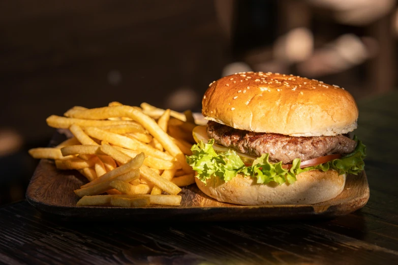 a hamburger and fries on a plate on a table, by Niko Henrichon, pexels contest winner, 15081959 21121991 01012000 4k, thumbnail, brown, restaurant menu photo