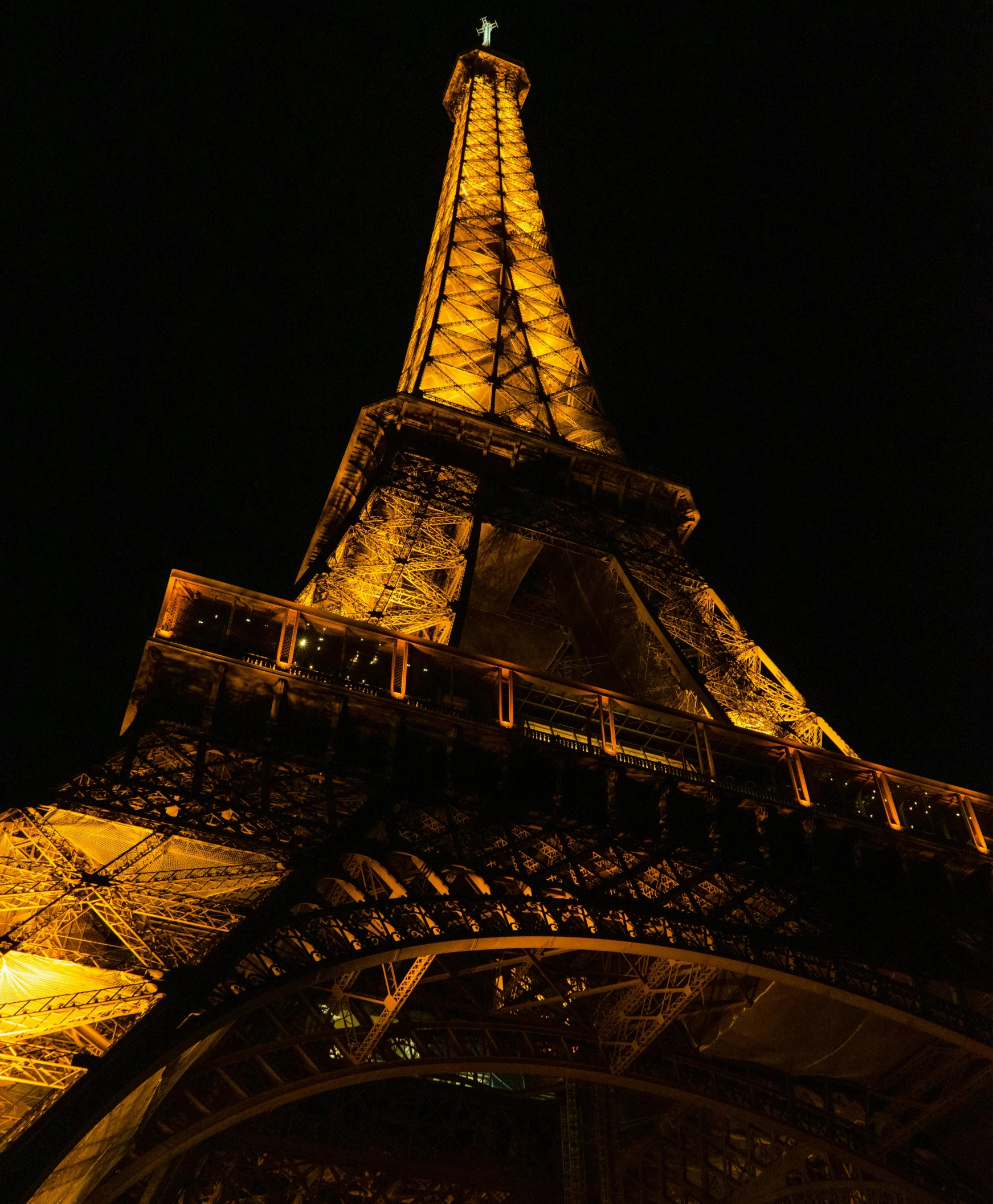 the eiffel tower is lit up at night, an album cover, by Daniel Gelon, pexels contest winner, renaissance, close - up portrait shot, in 2 0 1 2, 3/4 view from below, photo 8 k