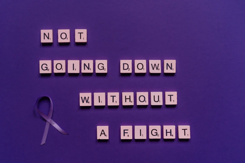 a sign that says not going down without a fight, inspired by Itō Seiu, pexels contest winner, purple ribbons, background image, instagram picture, profile picture