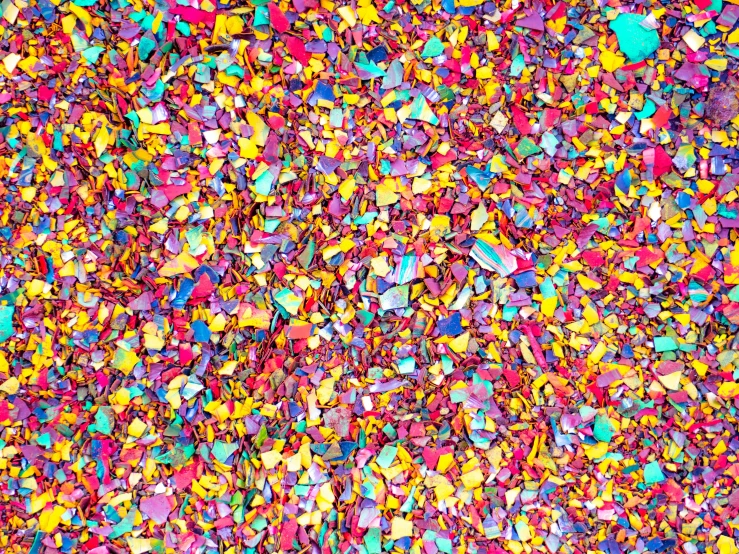 a pile of colorful confetti sprinkles, a mosaic, inspired by Howardena Pindell, color field, molten plastic, turquoise pink and yellow, shards, instagram post