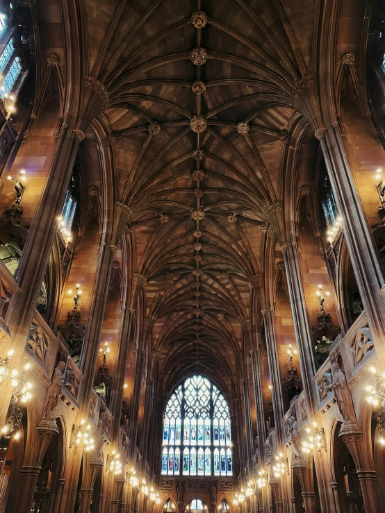 a large cathedral filled with lots of tall windows, an album cover, pexels contest winner, international gothic, manchester, brown, open ceiling, instagram story