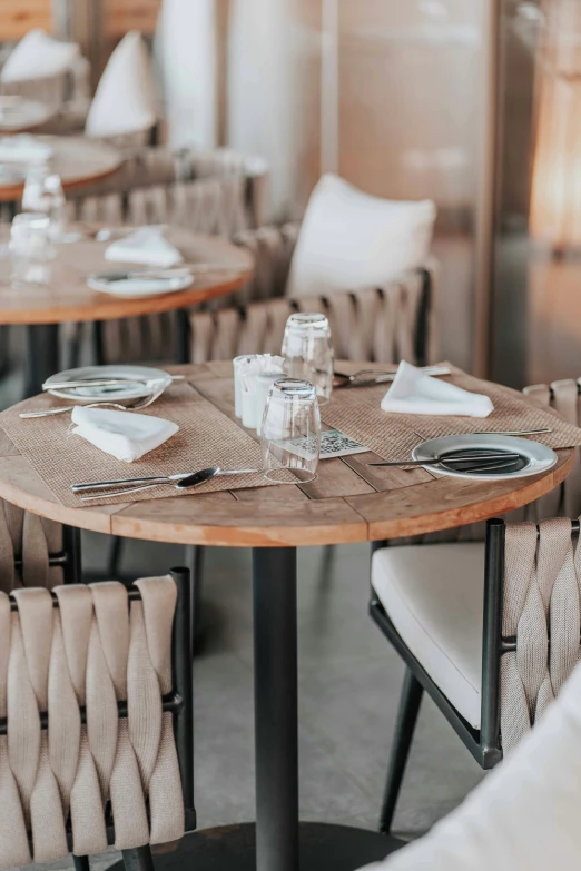 a dining room filled with lots of tables and chairs, unsplash, renaissance, teak table, round, linen, 2 5 6 x 2 5 6 pixels