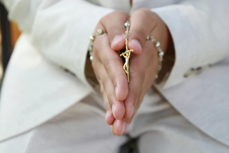 a close up of a person holding a rosary, press shot, 15081959 21121991 01012000 4k, instagram post, full body close-up shot