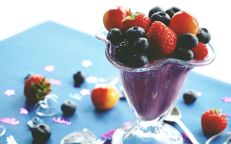 an ice cream sundae with strawberries and blueberries, pexels, renaissance, second colours - purple, holiday, milkshake, fruit bowl