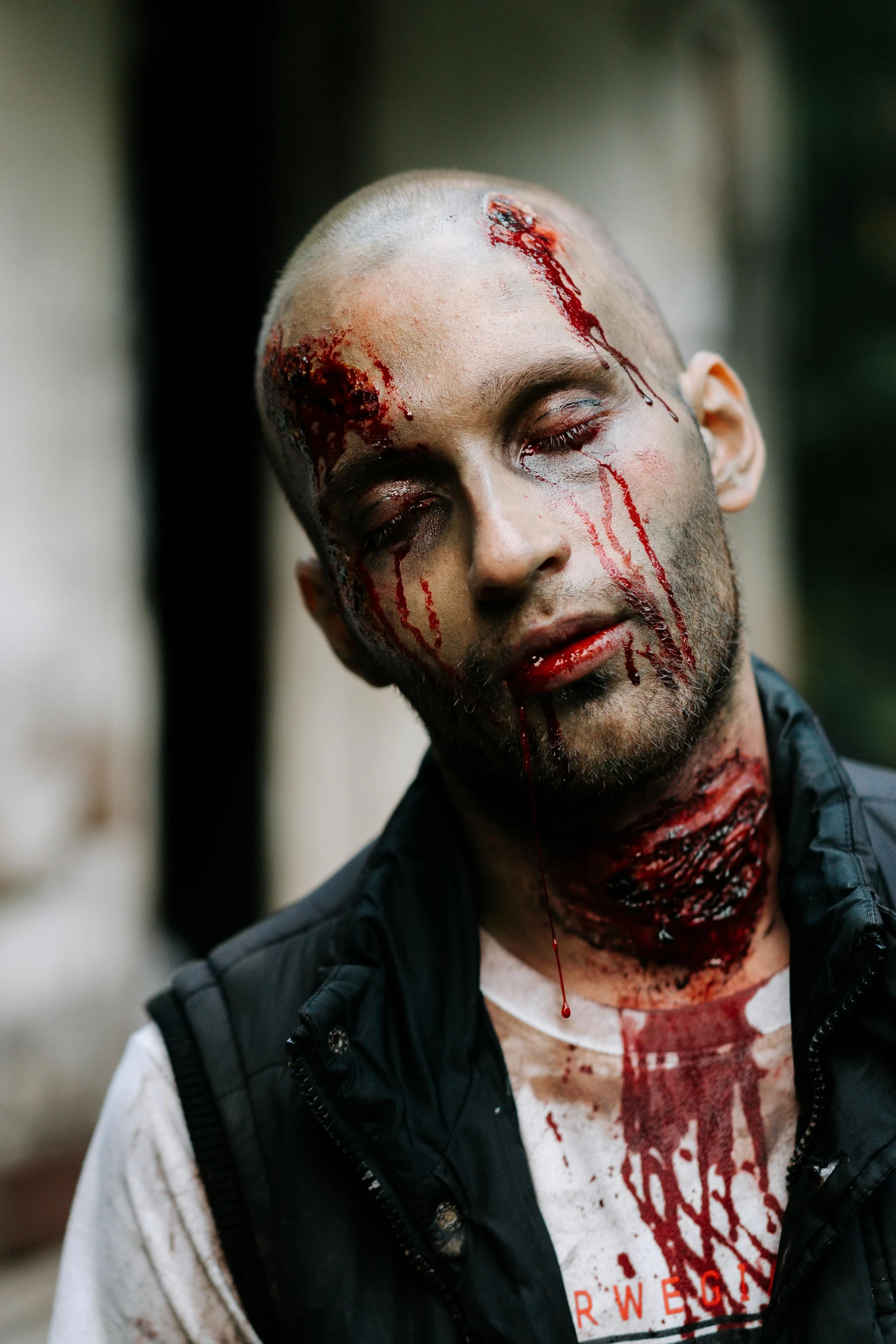 a man with blood all over his face, pexels contest winner, bald head and menacing look, beautiful zombie, cutest, holy