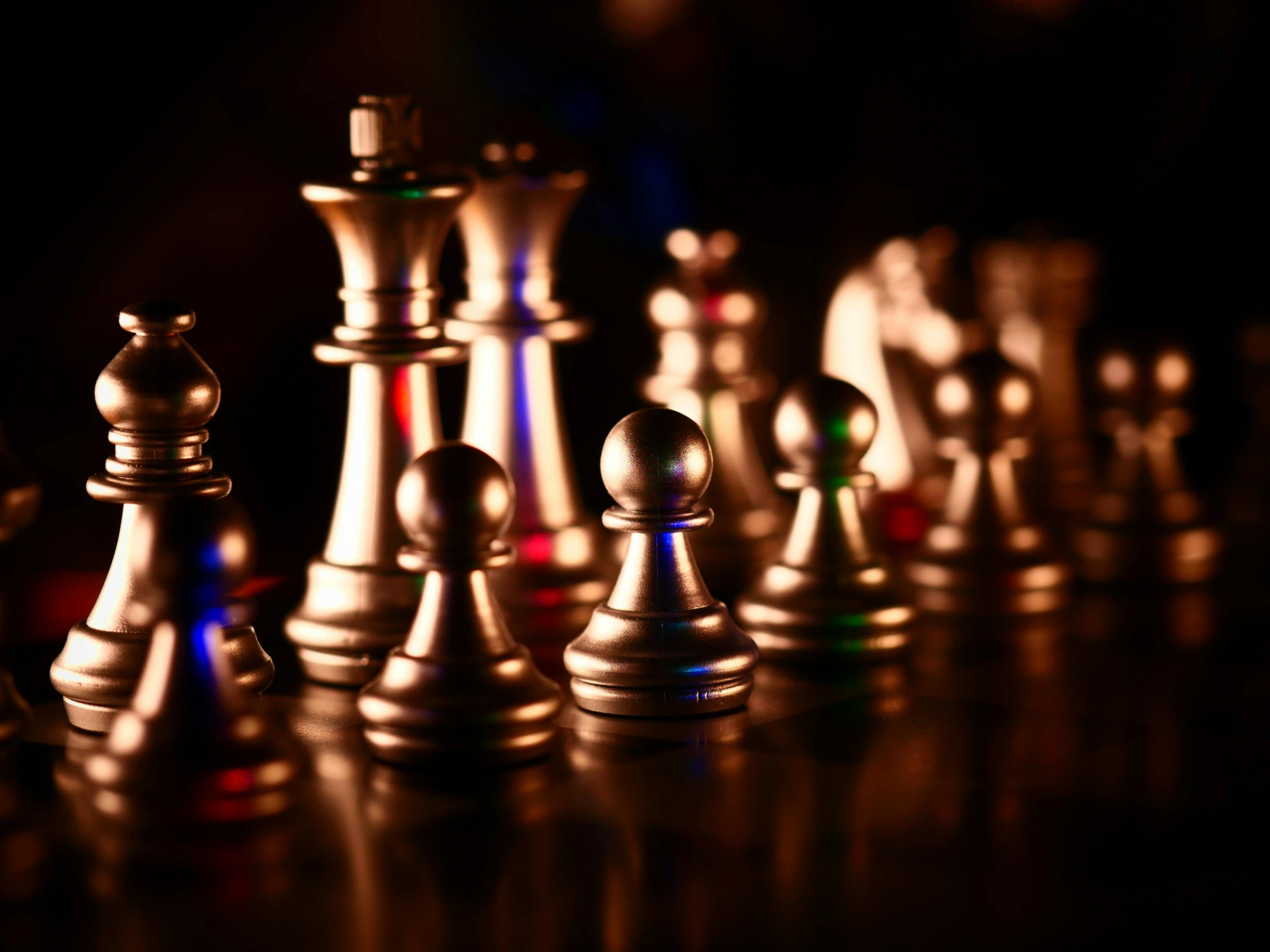 a group of chess pieces sitting on top of a table, glowing with silver light, thumbnail, shiny metal, close up photograph