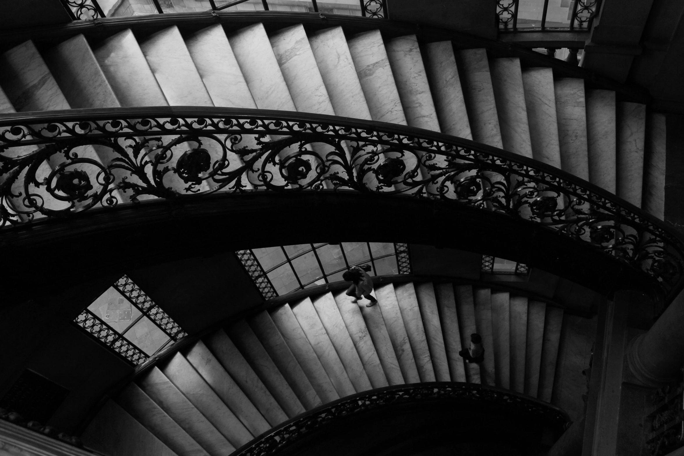 a black and white photo of a spiral staircase, inspired by Rodolfo Escalera, pexels contest winner, art nouveau, victorian lace, sweeping arches, museum light, steps