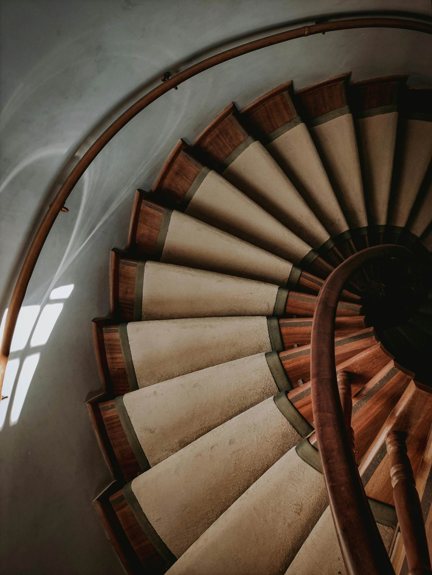 a spiral staircase leading to the top of a building, pexels contest winner, renaissance, brown and cream color scheme, staggered depth), about to step on you, ignant