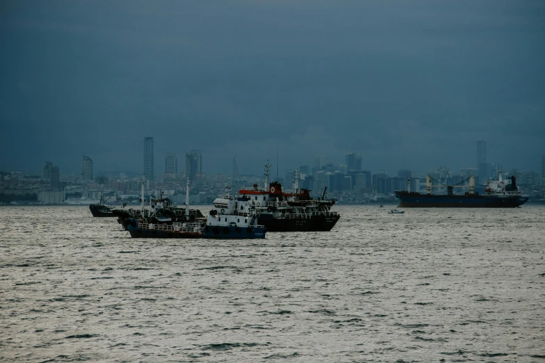 a couple of boats that are in the water, by Joseph Severn, pexels contest winner, hurufiyya, manila, shipfleet on the horizon, 200mm wide shot, buenos aires