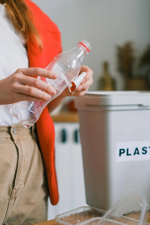 a woman putting a plastic bottle into a trash can, pexels contest winner, plasticien, avatar image, instagram post, resin, extra crisp image