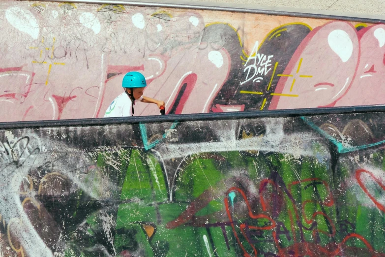 a man riding a skateboard up the side of a ramp, graffiti, green visor, birdseye view, multicoloured, chalked