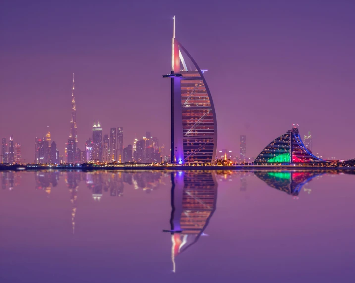 a very tall building in the middle of a large body of water, pexels contest winner, arabian night, shades of purple, foster and partners, neon megacity in the background