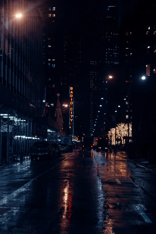 a city street at night in the rain, an album cover, inspired by Elsa Bleda, unsplash contest winner, realism, sci - fi scene future new york, empty streetscapes, dark academia aesthetic, gif
