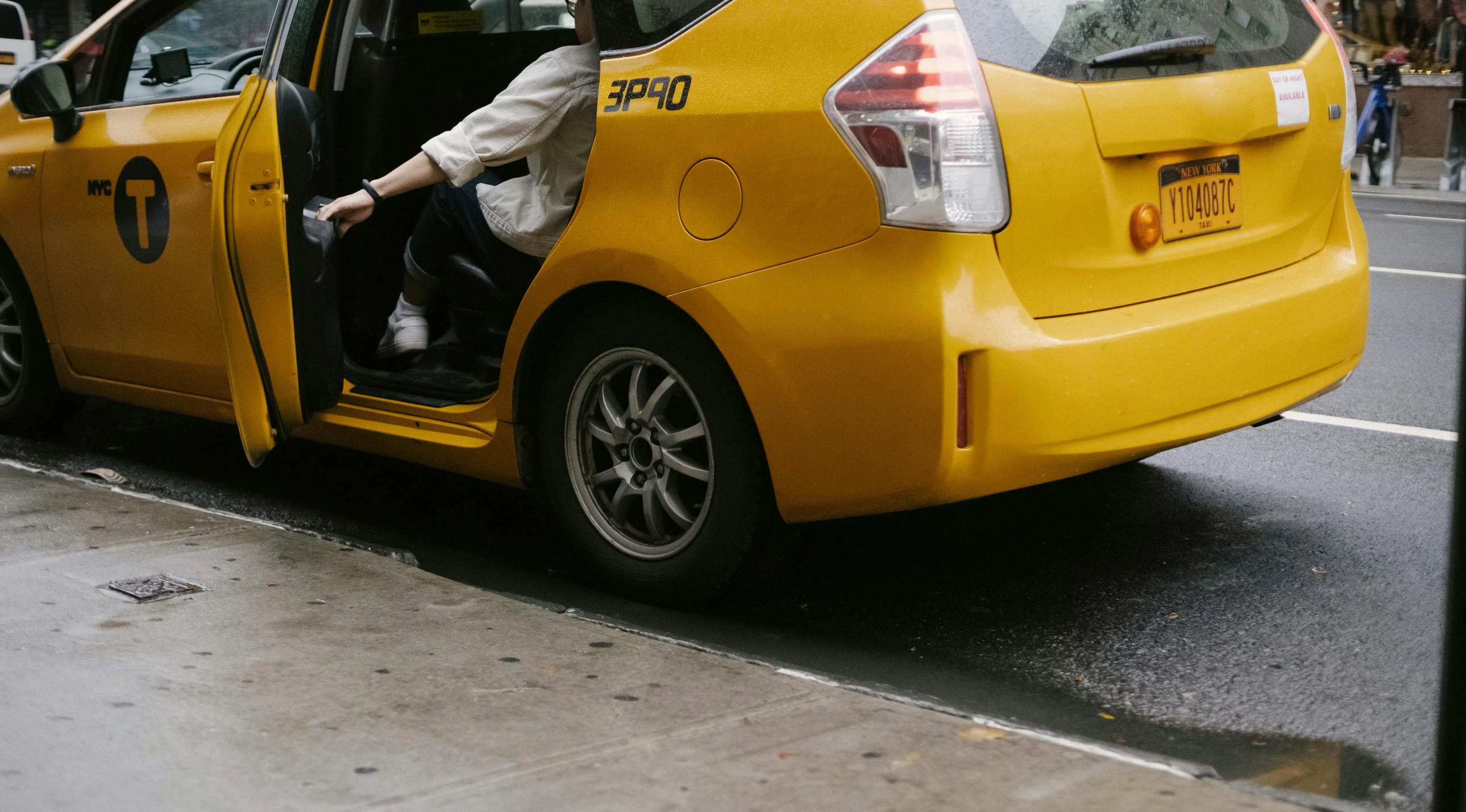 a man sitting in the driver's seat of a yellow taxi, pexels contest winner, standing sideways, accompanying hybrid, ad image, square