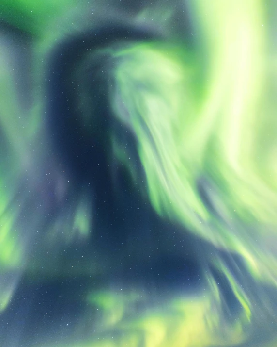 an image of an aurora bore in the sky, by Julia Pishtar, pexels contest winner, hurufiyya, standing in a maelstrom, light green and deep blue mood, blurred, profile image