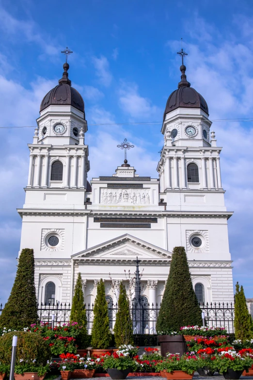 a large white building with a clock on the front of it, baroque, interplanetary cathedral, quebec, patagonian, 2019 trending photo