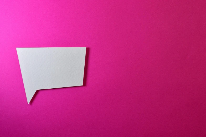 a speech bubble cut out of paper on a pink background, inspired by Frederick Hammersley, trending on pexels, postminimalism, long tail, about to consume you, white wall, arguing