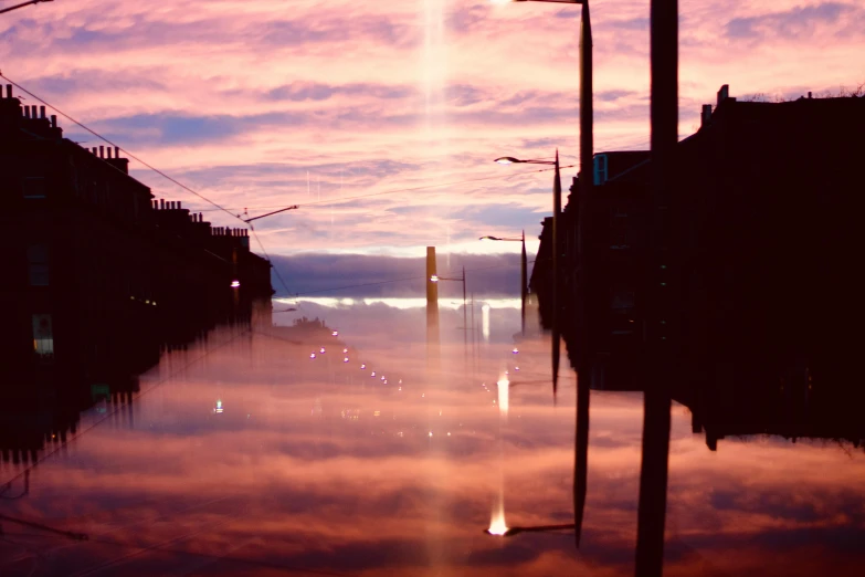 the sun is setting over a flooded street, pexels contest winner, pink reflections, glasgow, floating lights, surreal sky