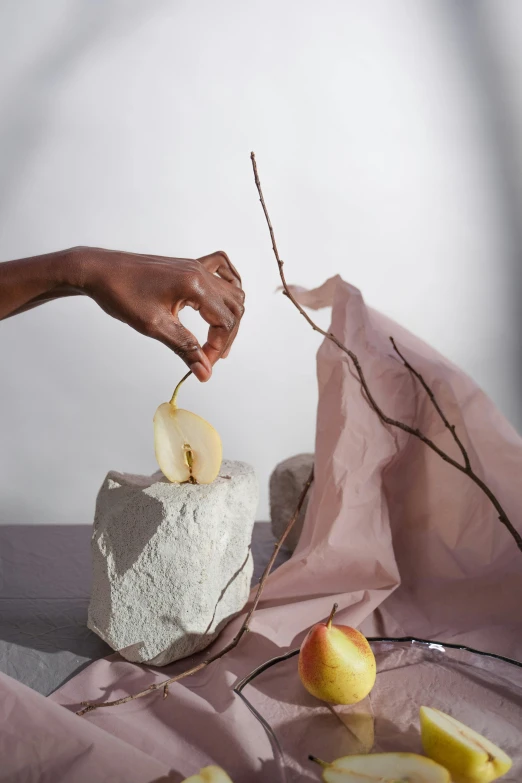 a person cutting a piece of cake with a knife, a marble sculpture, inspired by Robert Mapplethorpe, with fruit trees, 2019 trending photo, made of silk paper, aida muluneh