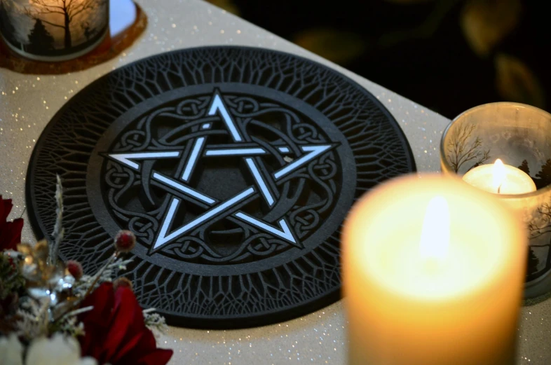 a black plate topped with a star of david surrounded by candles, trending on pexels, gothic art, yennefer, detailed acrylic, engraved, a close up shot