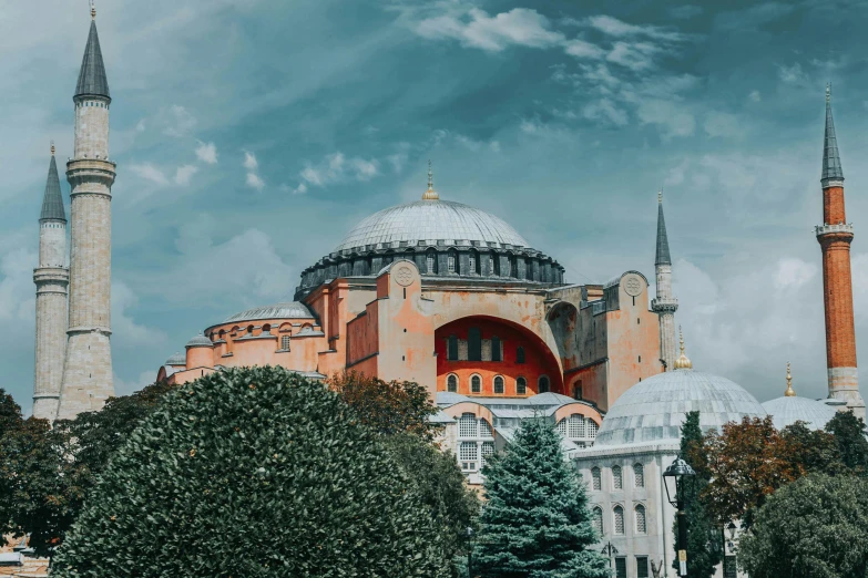 a group of people standing in front of a building, a colorized photo, pexels contest winner, hurufiyya, domes, byzantine, 🚿🗝📝, viewed from the ground