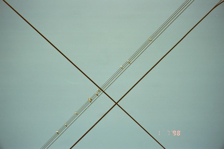 a large jetliner flying through a blue sky, an album cover, inspired by László Moholy-Nagy, postminimalism, exposed wires, 1981 photograph, microscopy, 144x144 canvas