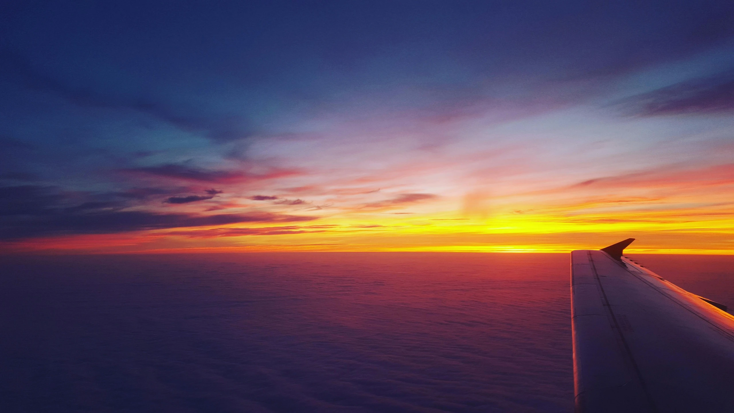 the wing of an airplane as the sun sets, pexels contest winner, romanticism, auckland sky tower, endless sky, instagram post, brightly colored