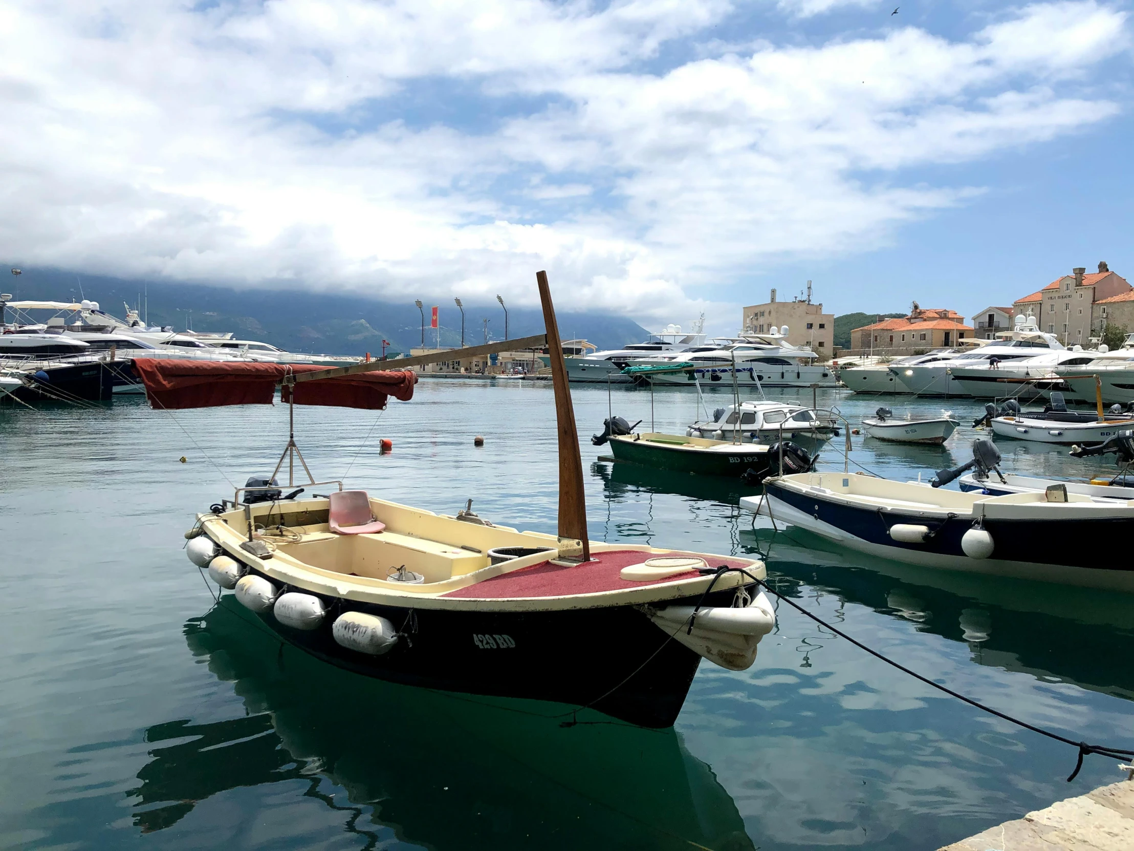 a number of boats in a body of water, a picture, pexels contest winner, traditional corsican, avatar image, square, eva elfie