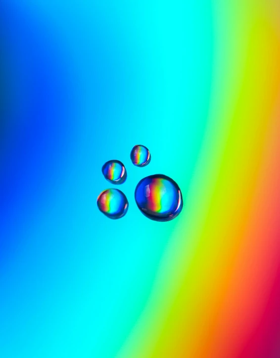 a close up of water droplets on a colorful background, a raytraced image, inspired by Gabriel Dawe, just one rainbow 8 k, color ( sony a 7 r iv, chromatic, alternate album cover