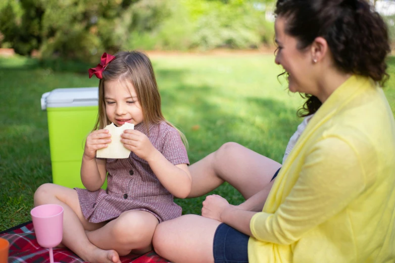 a woman and a little girl sitting on a blanket, eating cheese, square, te pae, 15081959 21121991 01012000 4k