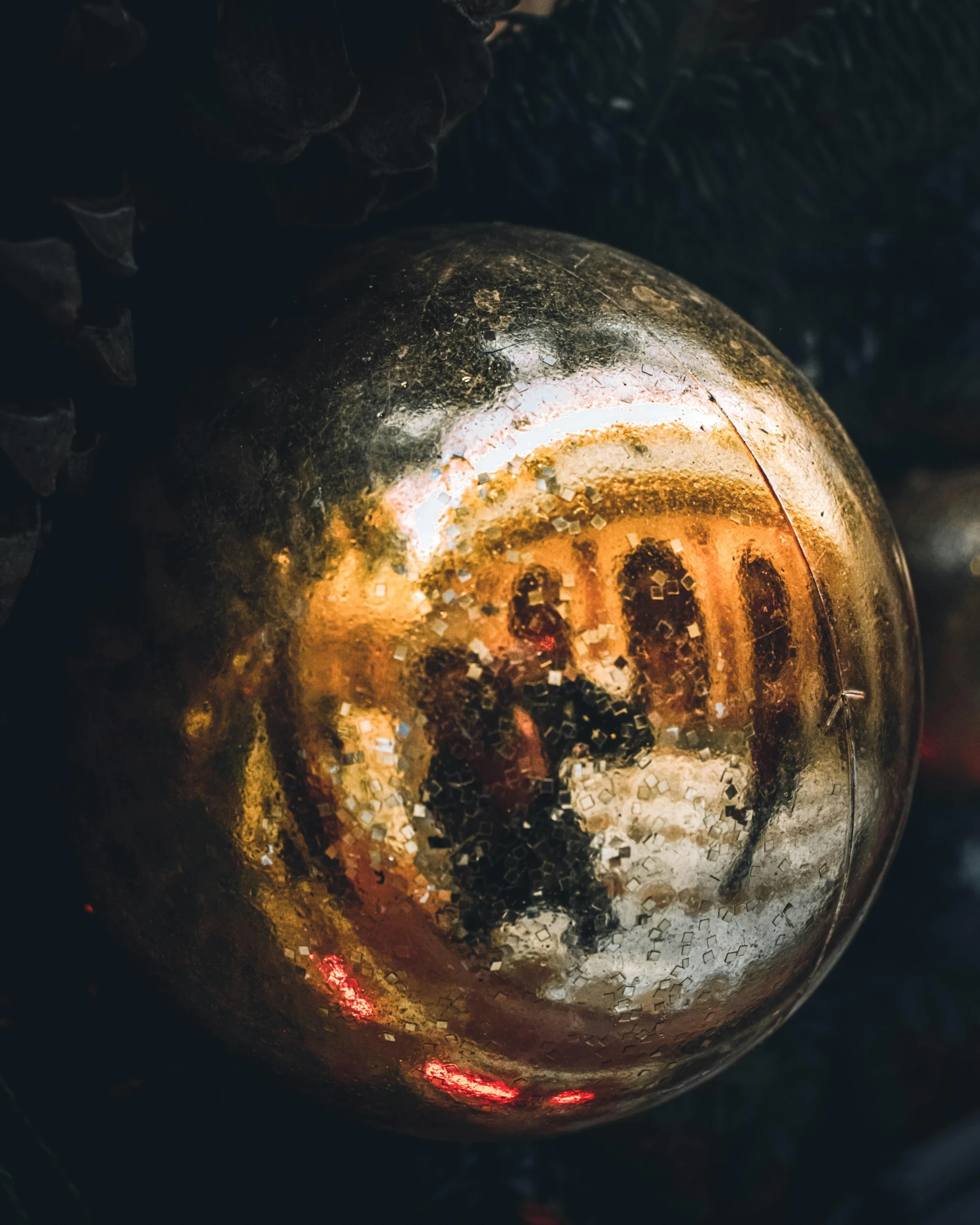 a close up of a christmas ornament on a tree, by Julia Pishtar, pexels contest winner, baroque, reflective surface, ghost sphere, ilustration, moody details