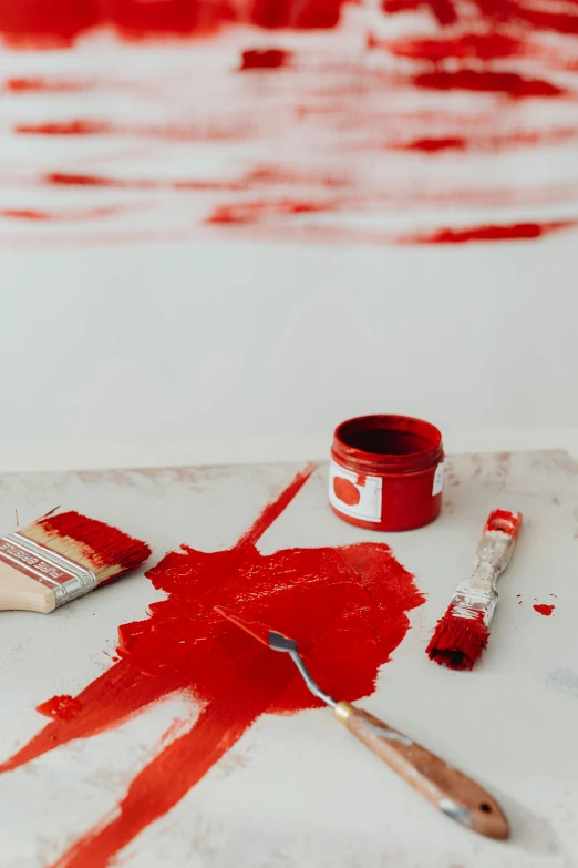 a close up of paint and paintbrushs on a table, a minimalist painting, trending on pexels, blueprint red ink, red carpeted floor, ilustration, set against a white background