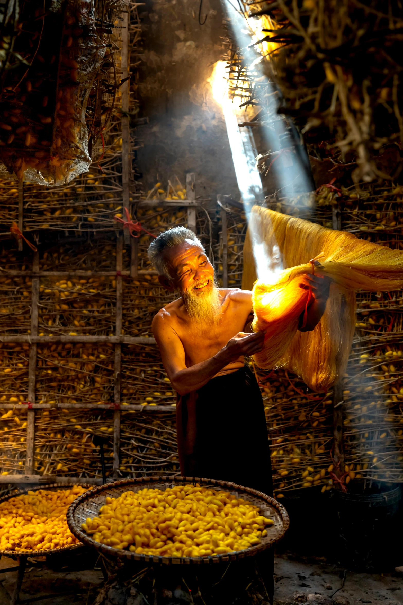 a man standing in front of a pile of food, a picture, pexels contest winner, process art, from inside a temple, praying with tobacco, wizard holding a cage, back light