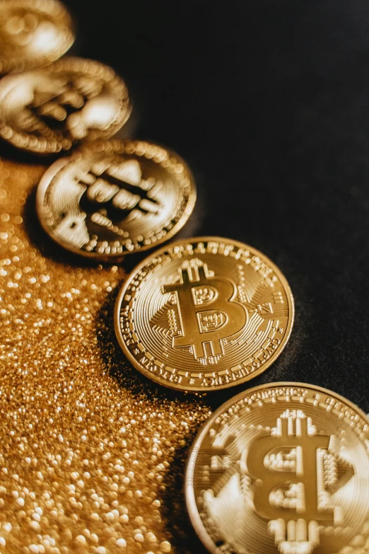 a row of bitcoins sitting on top of a table, by Julia Pishtar, renaissance, gold flakes, thumbnail, multi-part
