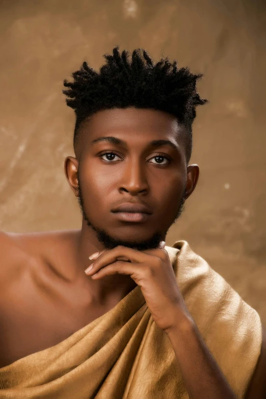 a man in a towel posing for a picture, an album cover, inspired by Chinwe Chukwuogo-Roy, trending on pexels, renaissance, cai xukun, ( ( brown skin ) ), serene expression, brown:-2