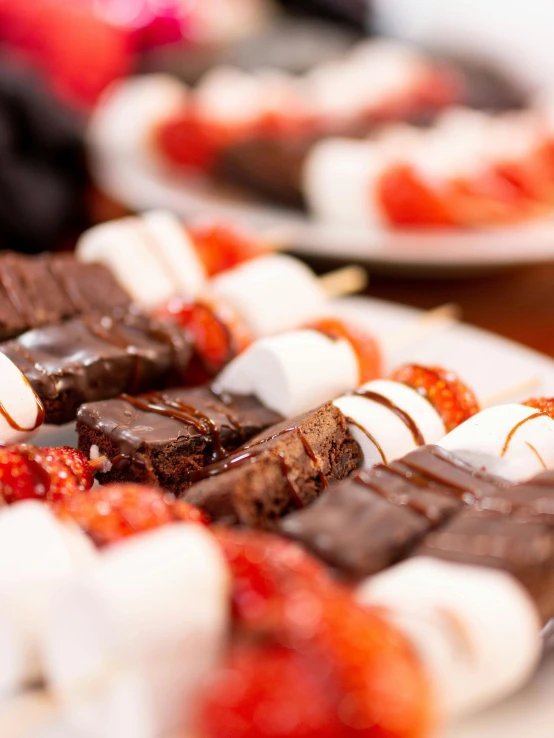 a close up of a plate of food on a table, a table full of candy, profile image