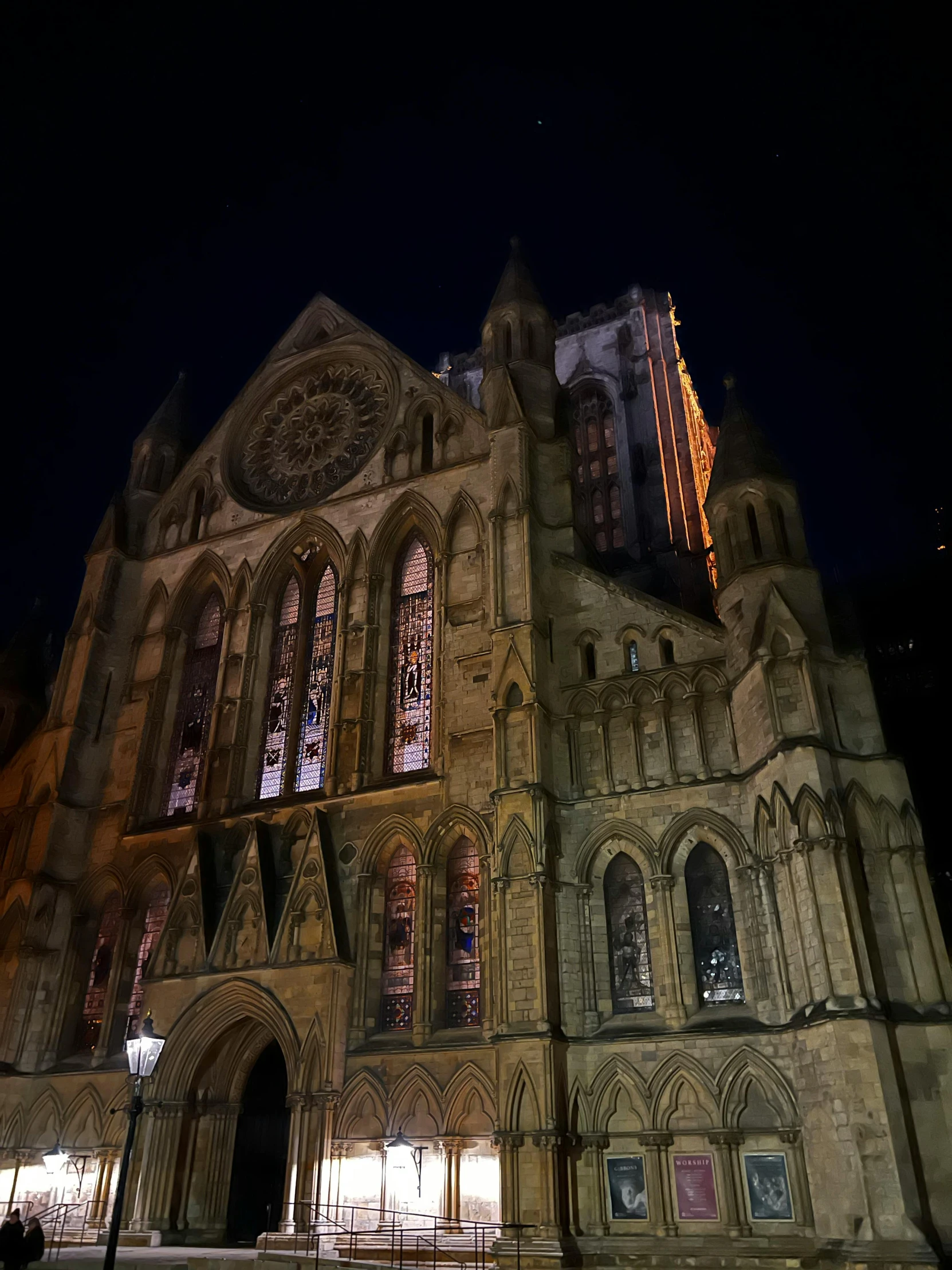 a large cathedral is lit up at night, by Ben Thompson, shot from roofline, slate, photo taken in 2 0 2 0, haunted