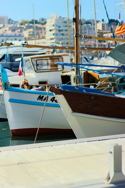 a number of boats in a body of water, cannes, slide show, close - up photo