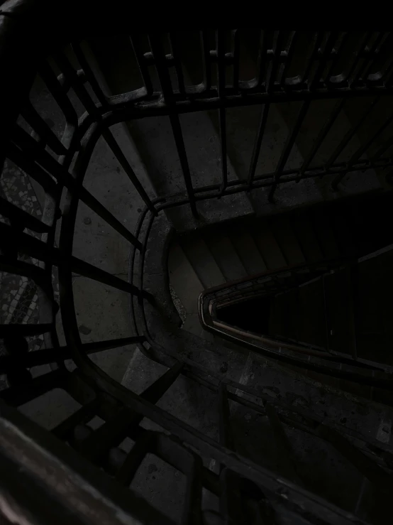 a black and white photo of a spiral staircase, an album cover, inspired by Katia Chausheva, unsplash contest winner, horror wallpaper aesthetic, ignant, background image, dark aesthetic