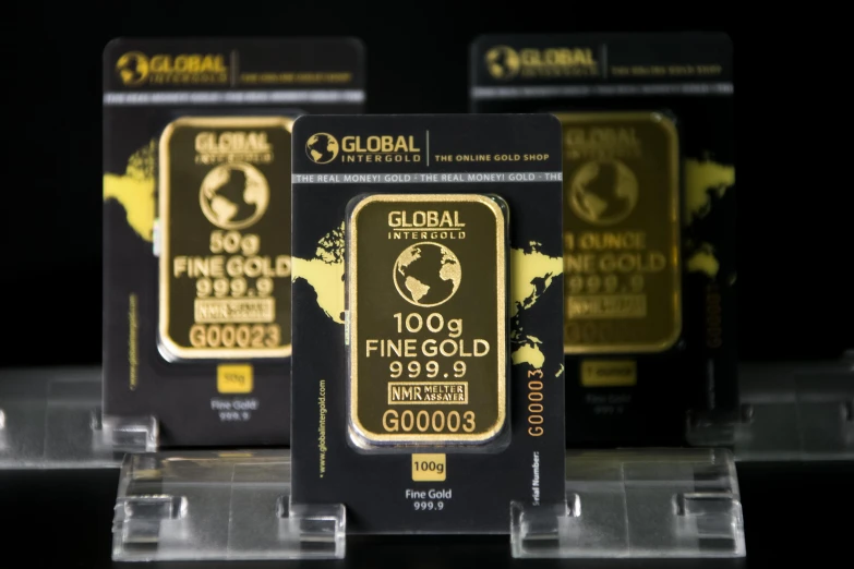 a group of gold bars sitting on top of each other, by Sam Black, pexels contest winner, art nouveau, globes, vantablack wall, israel, $100000000