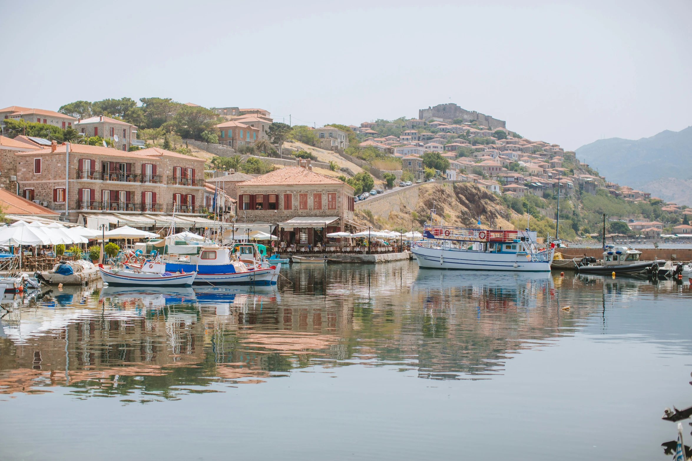 a number of boats in a body of water, a photo, pexels contest winner, renaissance, hydra, pastel hues, reflecting, panoramic